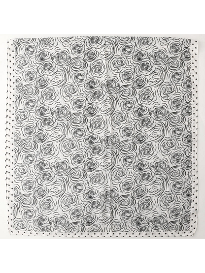 Rose-pattern scarf spread flat with a polka dot border