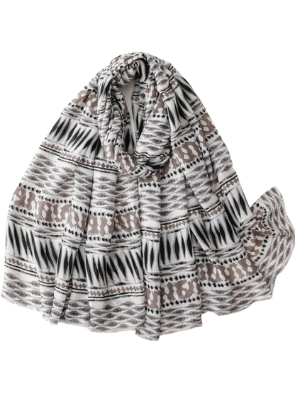 Multicolor scarf with abstract geometric bands and fringed edges, looped overview