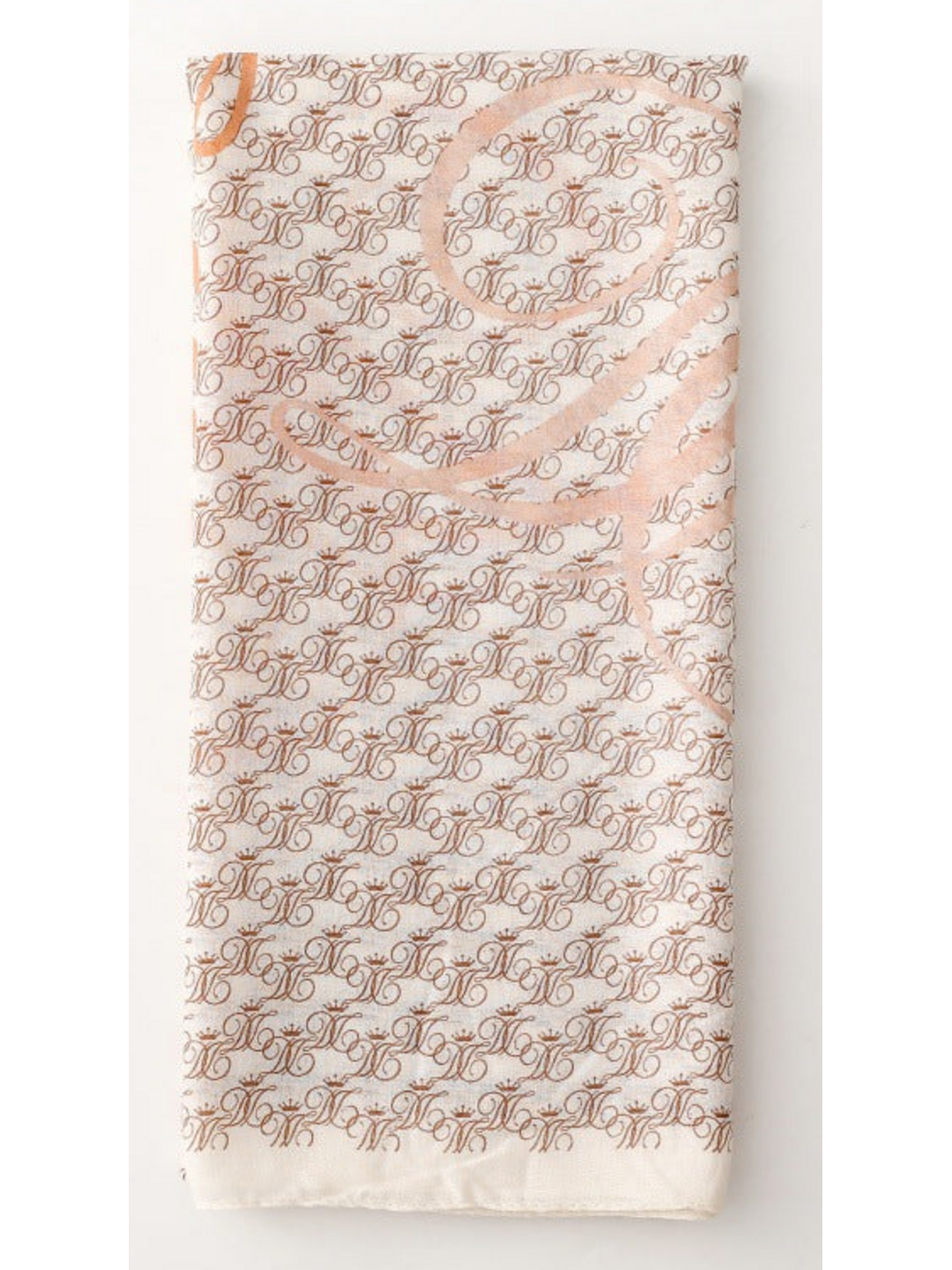 Ivory scarf folded lengthwise, showing brown ornate motifs and a pale orange flourish