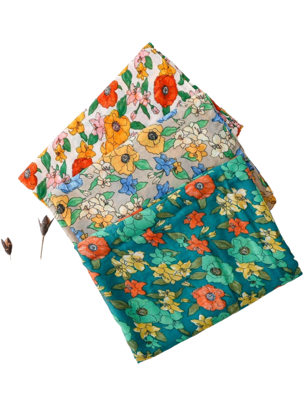 Three floral scarf colorways displayed folded together