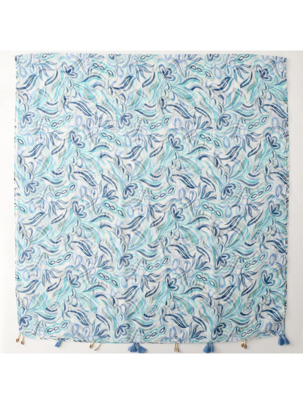 Blue scarf spread flat, showing the overall floral and leaf pattern and decorative edge trim