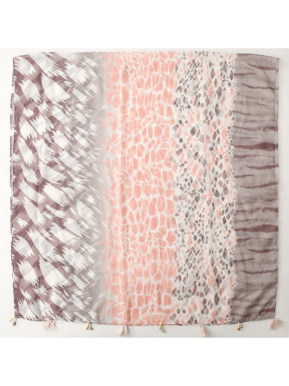 Scarf spread flat to show pink, gray and brown geometric, spotted and striped panels