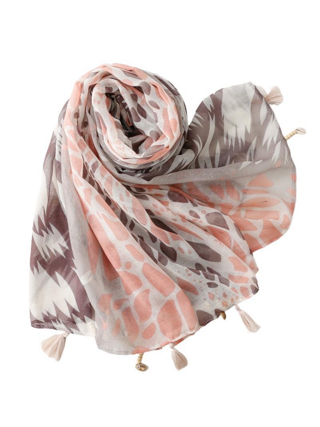 Pink, gray and brown patterned scarf loosely coiled with tassel-trimmed ends spread out