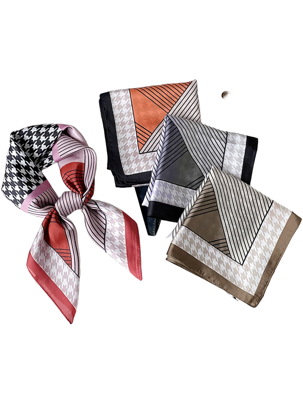 Four scarf colorways with houndstooth, stripes and contrasting borders displayed together