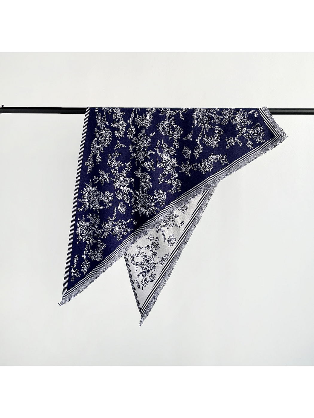 Navy floral triangle scarf with striped border, fringe and cream reverse