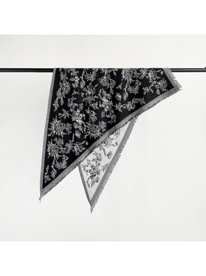 Black floral triangle scarf with striped border, fringe and cream reverse