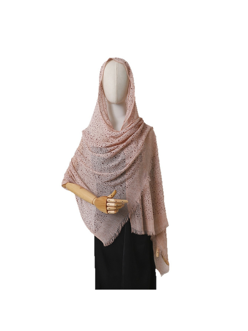 Pink openwork scarf draped over a mannequin with fringed edges, front view