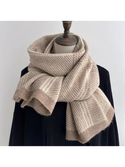 Beige plaid scarf loosely knotted on a mannequin