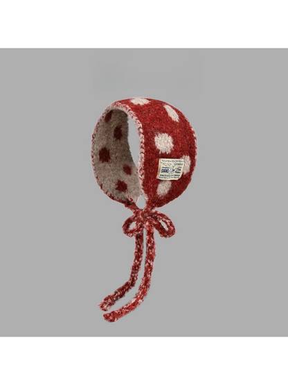 Red polka-dot hood-shaped scarf with contrasting inner side and long bow ties