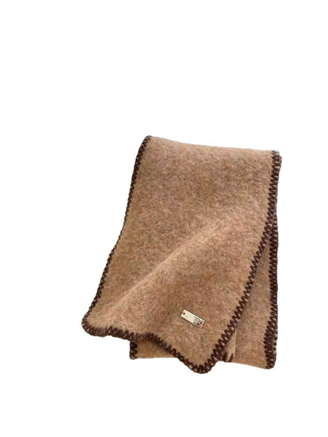 Camel scarf folded on white with dark brown blanket-stitched edges