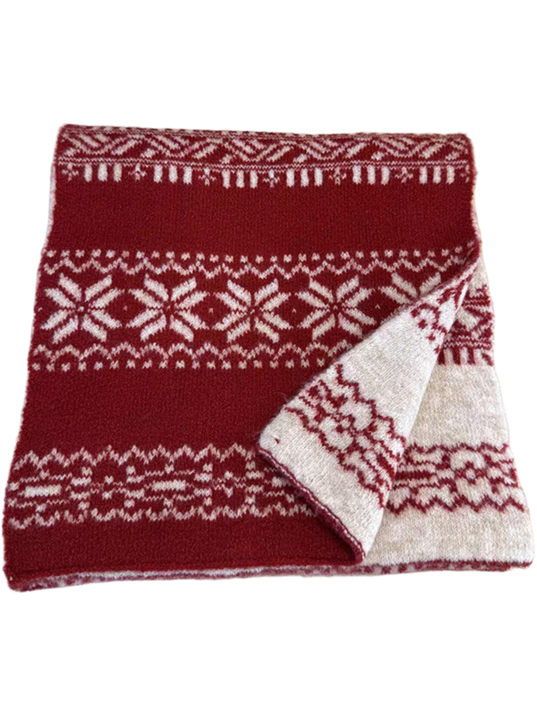 Red snowflake-pattern scarf folded with an ivory corner turned back