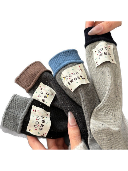 Rufia casual crew socks displayed flat showing full length and speckled pattern