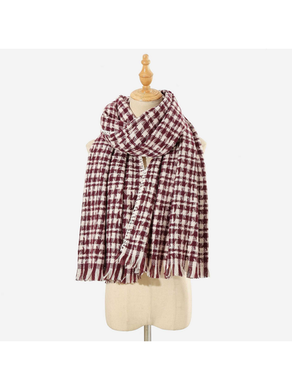 Burgundy plaid scarf with fringed ends, looped on a mannequin