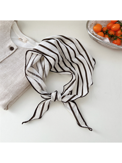 Ivory Single Stripes triangle scarf tied in a loop