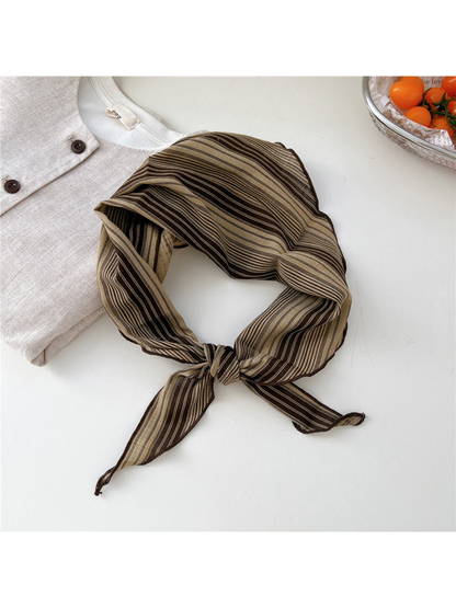 Khaki Grouped Stripes triangle scarf tied in a loop