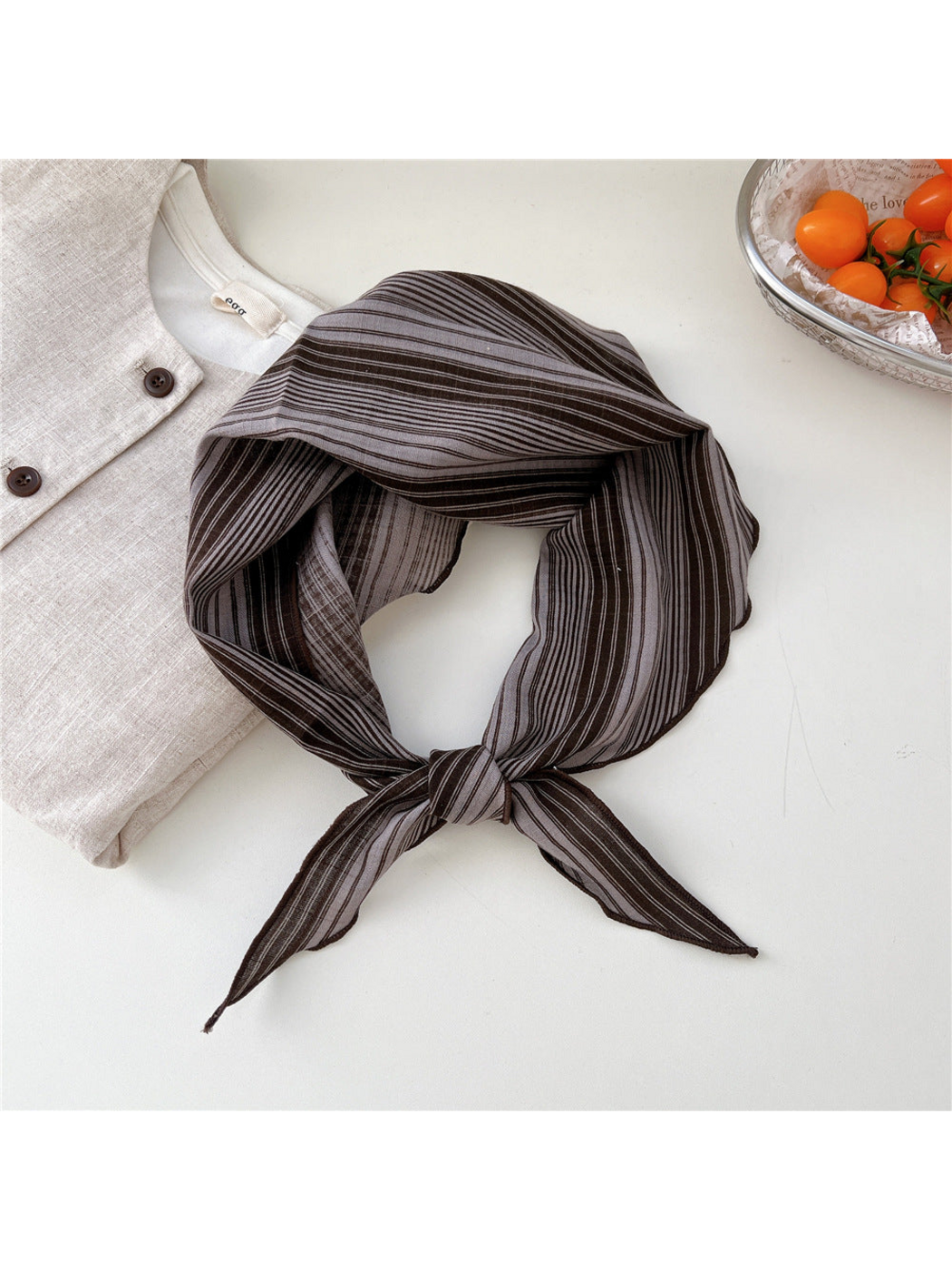 Gray Grouped Stripes triangle scarf tied in a loop
