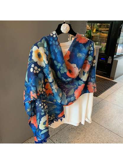 Multicolor floral scarf arranged asymmetrically over a white top