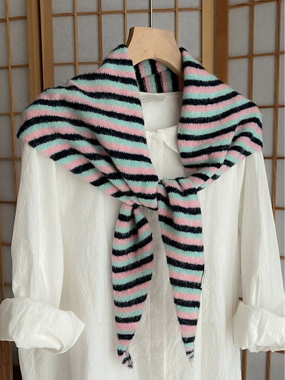 Pink striped scarf tied over a white shirt
