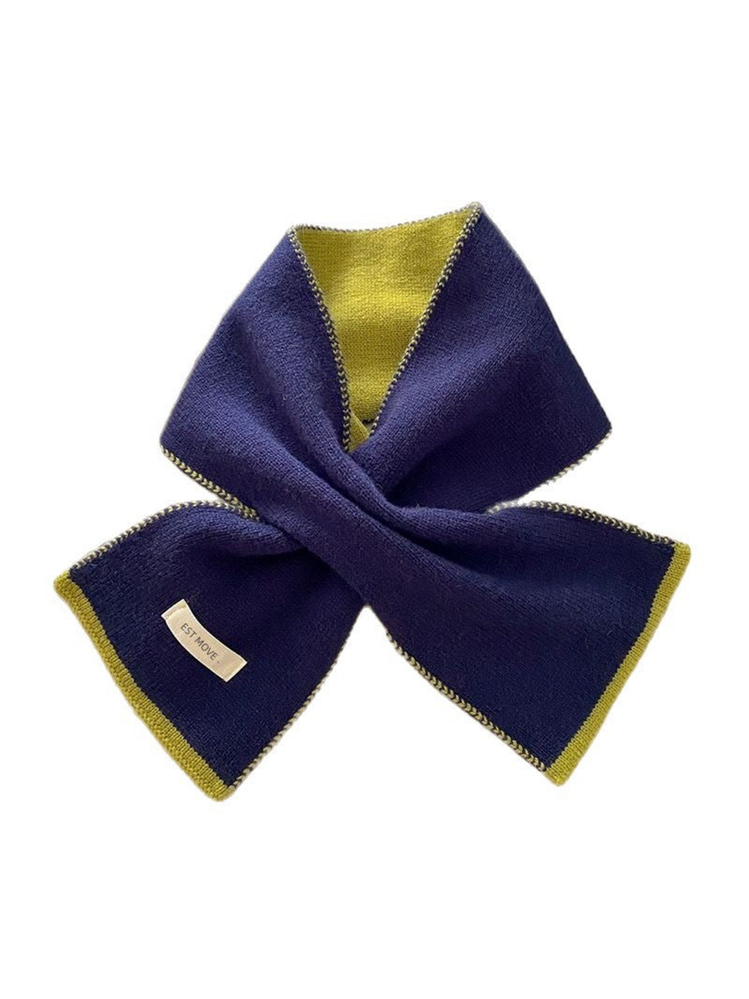 Navy knit scarf with contrasting green trim, looped on white