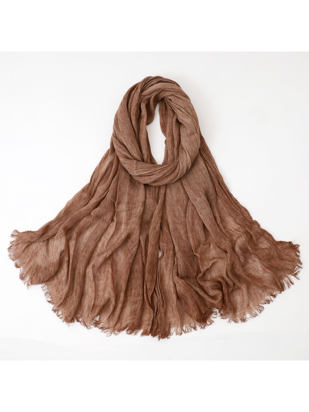 Camel scarf looped with crinkled texture and fringed edges