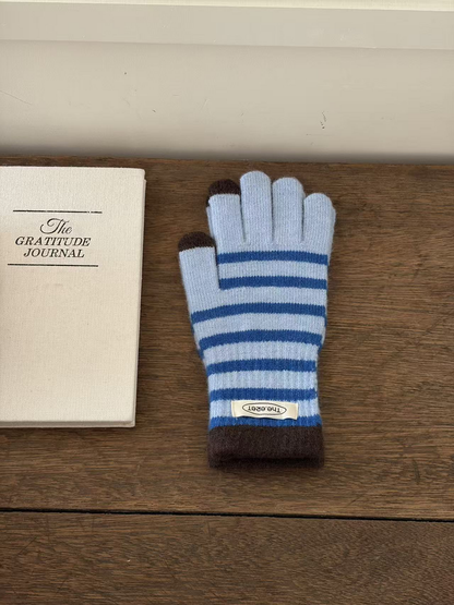 Blue striped glove with brown cuff and contrasting fingertips