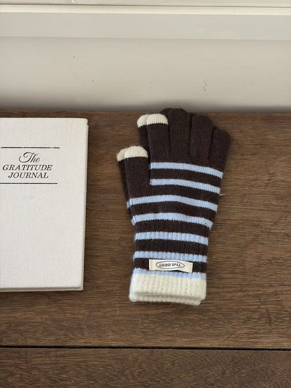 Brown glove with light blue stripes, ivory cuff and contrasting fingertips