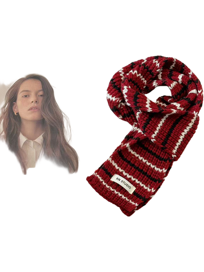 Burgundy knit scarf with black and white stripes, looped with the KN STUDIO label visible