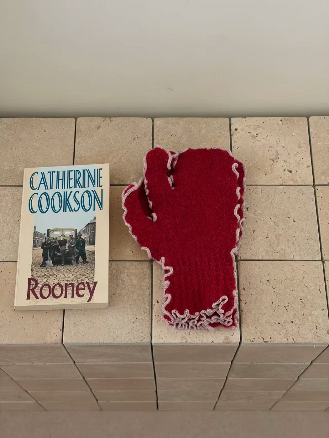 Red mittens with pale contrasting ruffled edging and ribbed cuffs