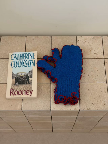Blue mittens with red ruffled edging and ribbed cuffs