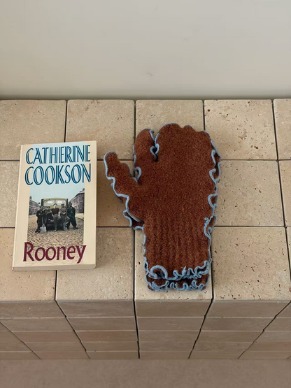 Caramel mittens with blue ruffled edging and ribbed cuffs