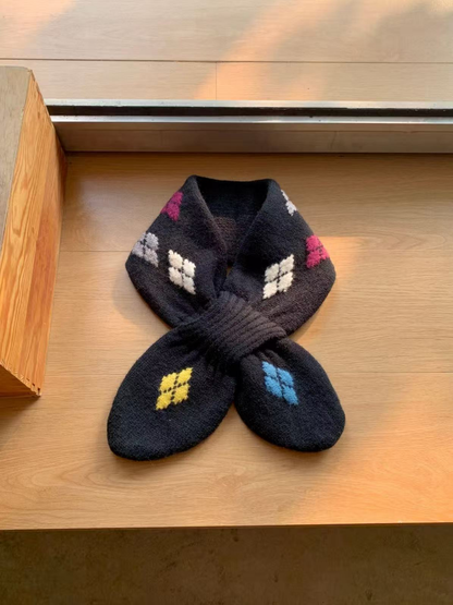 Black knit scarf with multicolored geometric motifs and rounded crossover ends