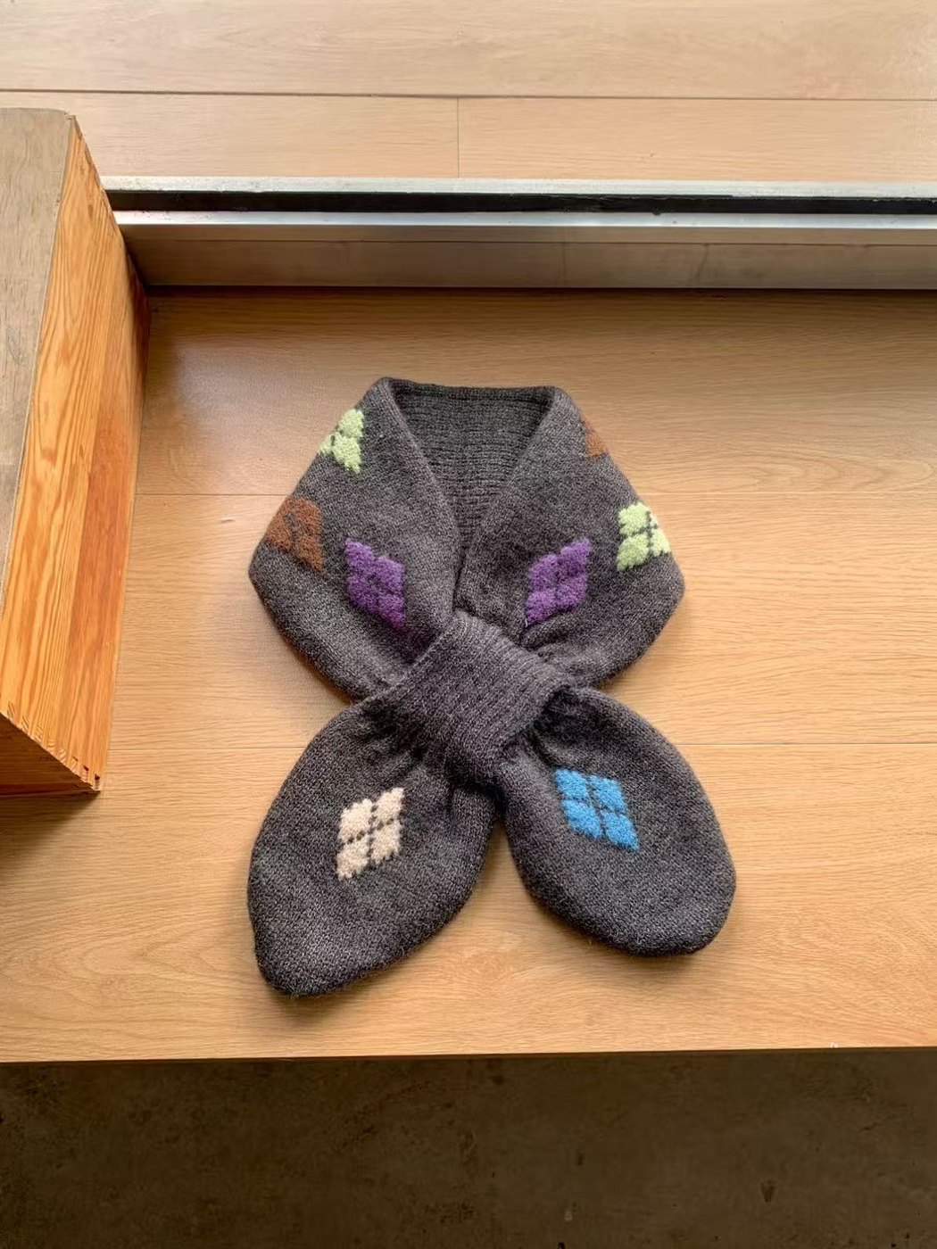 Dark Gray knit scarf with purple, pale green, brown, cream and blue motifs