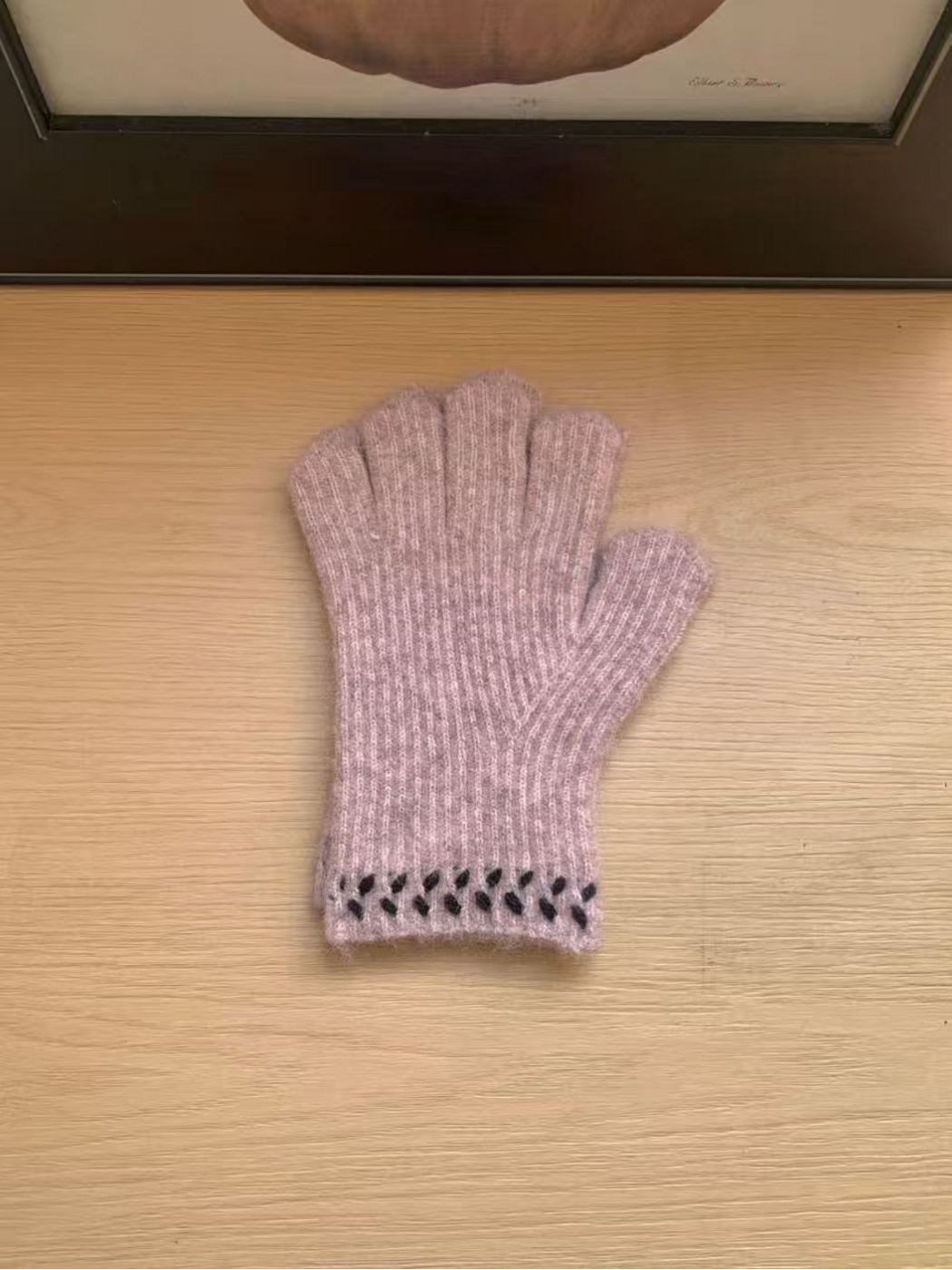 Pink ribbed gloves with dark leaf-like cuff embroidery