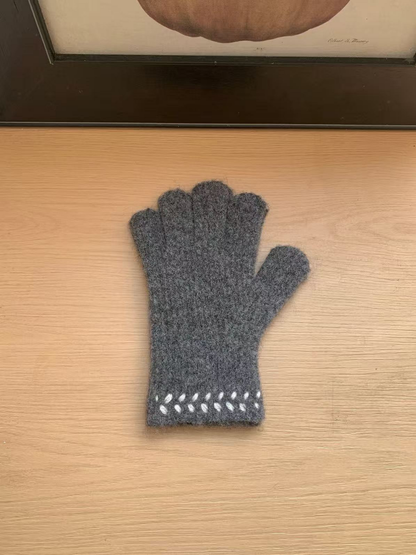 Gray gloves with fuzzy surface texture and contrasting cuff embroidery