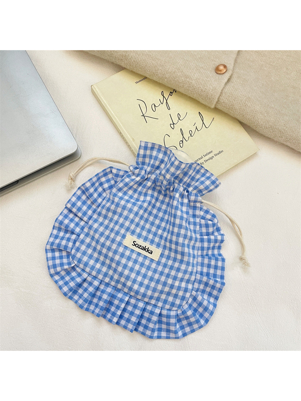 Light Blue gingham drawstring pouch with cream cords and ruffled trim