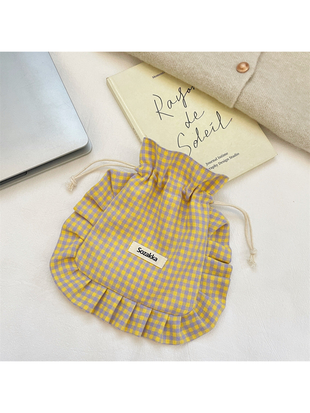 Purple gingham drawstring pouch with yellow checks, cream cords and ruffled border
