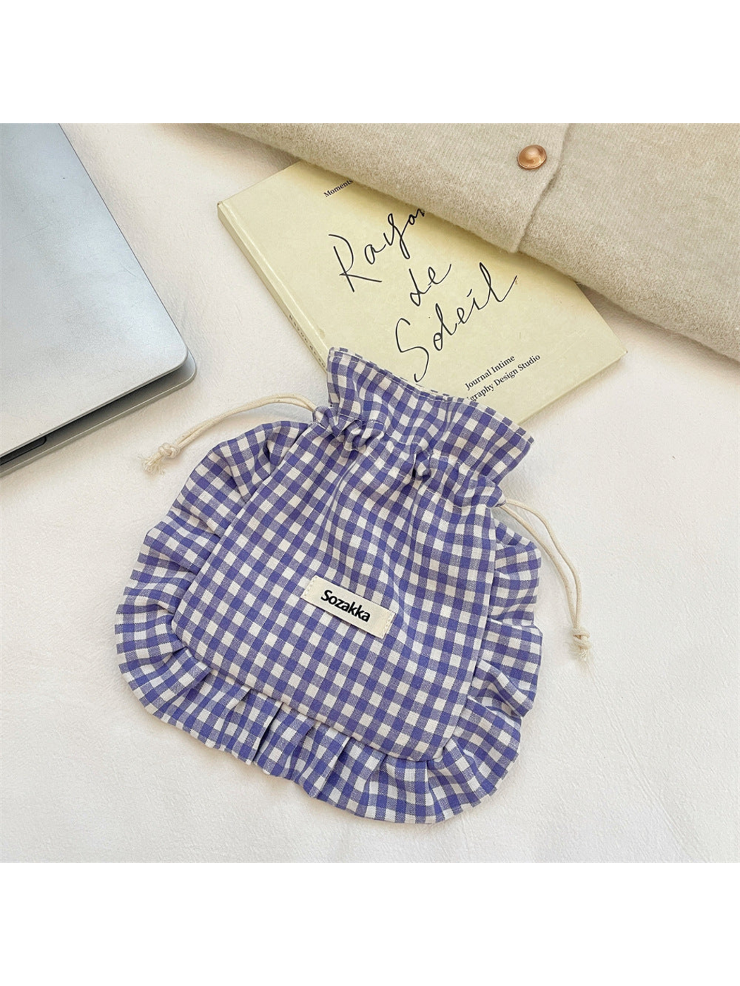 Purple gingham drawstring pouch with cream cords and ruffled trim