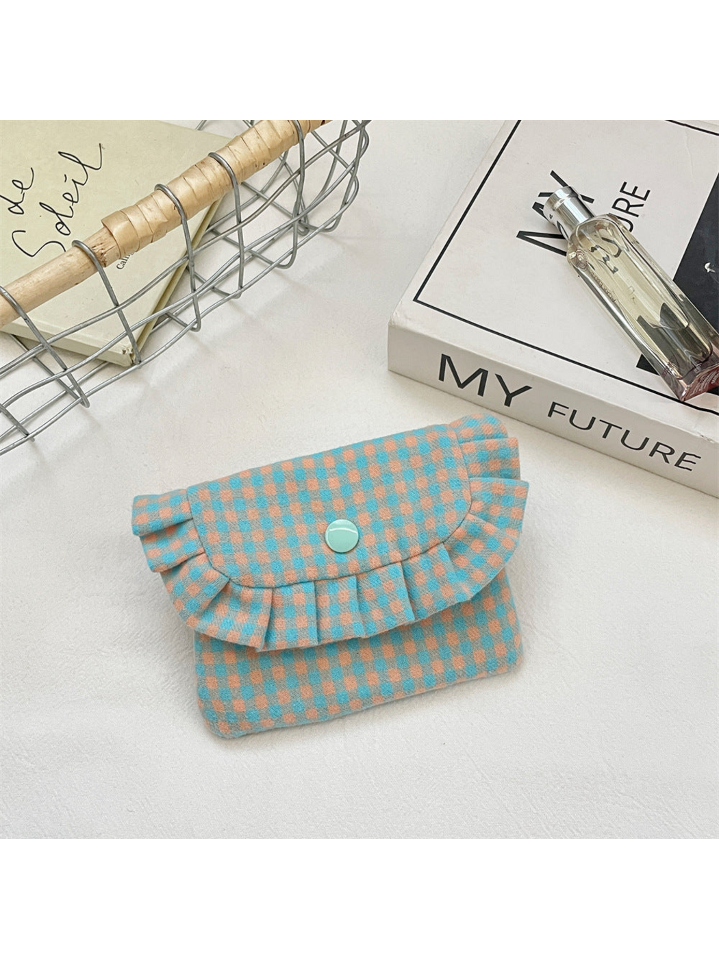 Turquoise coin purse with turquoise and peach gingham checks and a ruffled flap