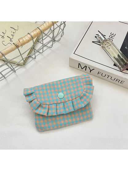 Turquoise coin purse with turquoise and peach gingham checks and a ruffled flap