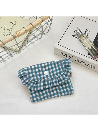 Teal Blue gingham coin purse with a ruffled flap and white snap, front view