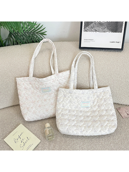 Pink and Gray floral quilted tote bags displayed together