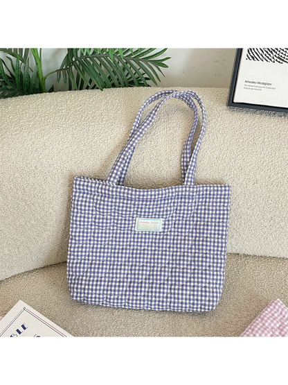 Purple gingham quilted tote bag with long handles, upright front view