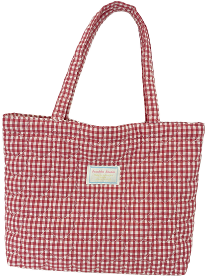 Burgundy and white gingham quilted tote bag with two long handles and its original attached front label