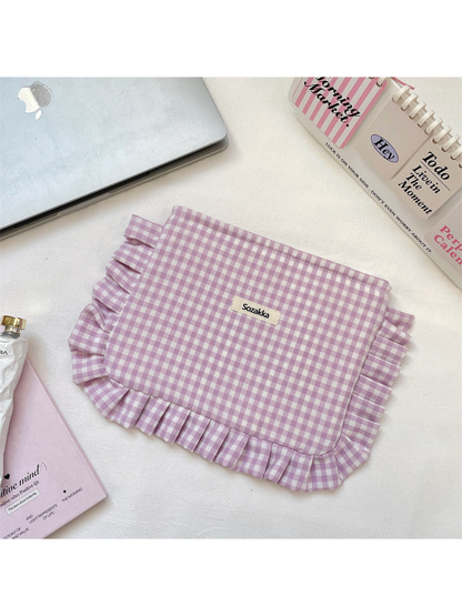 Light Purple gingham cosmetic pouch with white checks and ruffled trim, flat front view