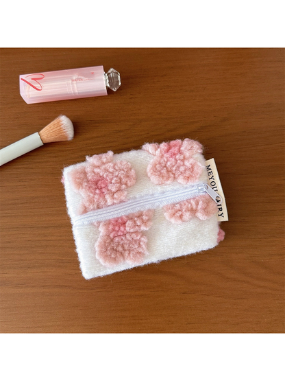 Flowers makeup bag with raised blush pink flowers on white