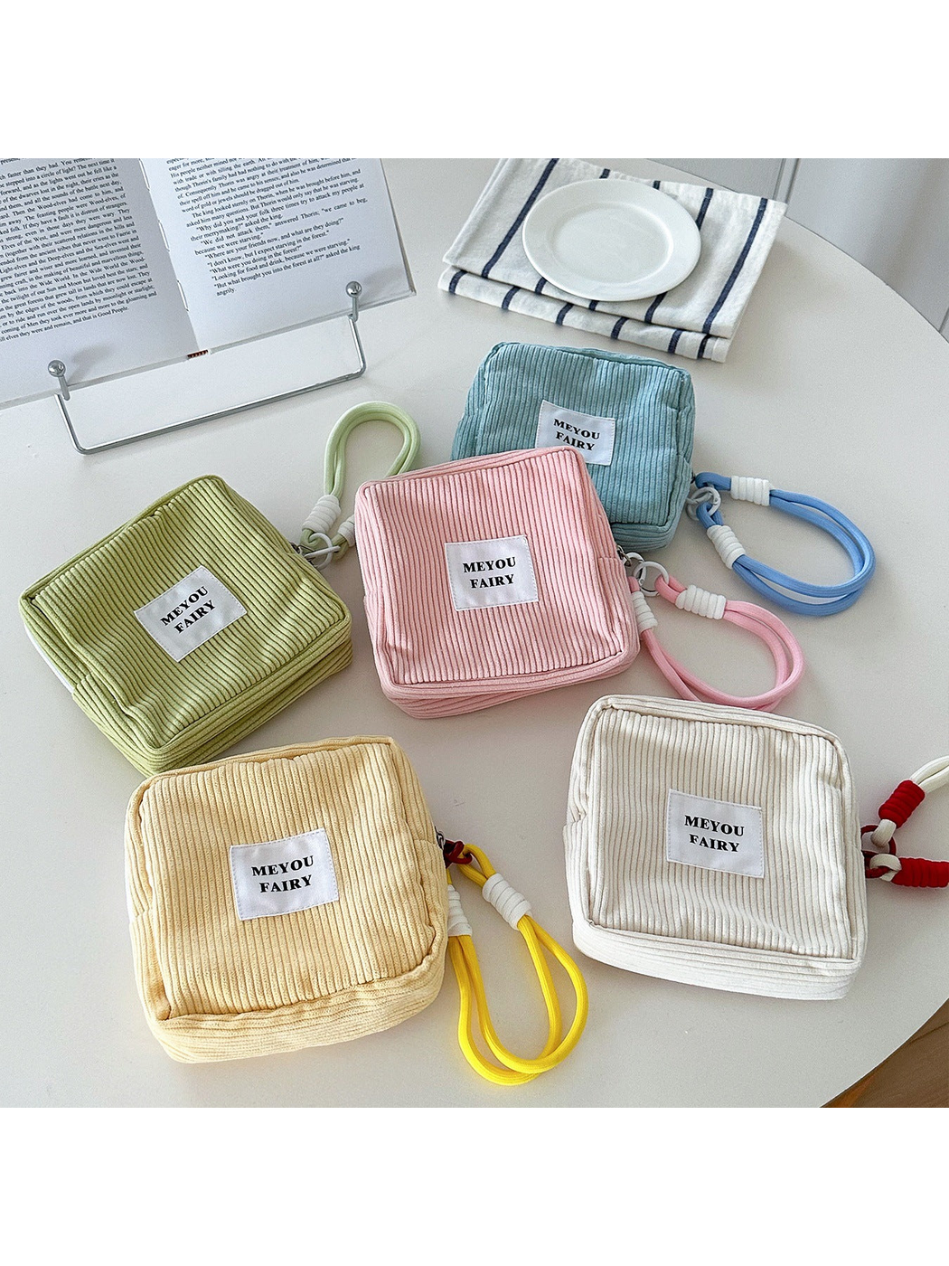 Green, Blue, Pink, Yellow and Beige ribbed makeup bags with wrist loops