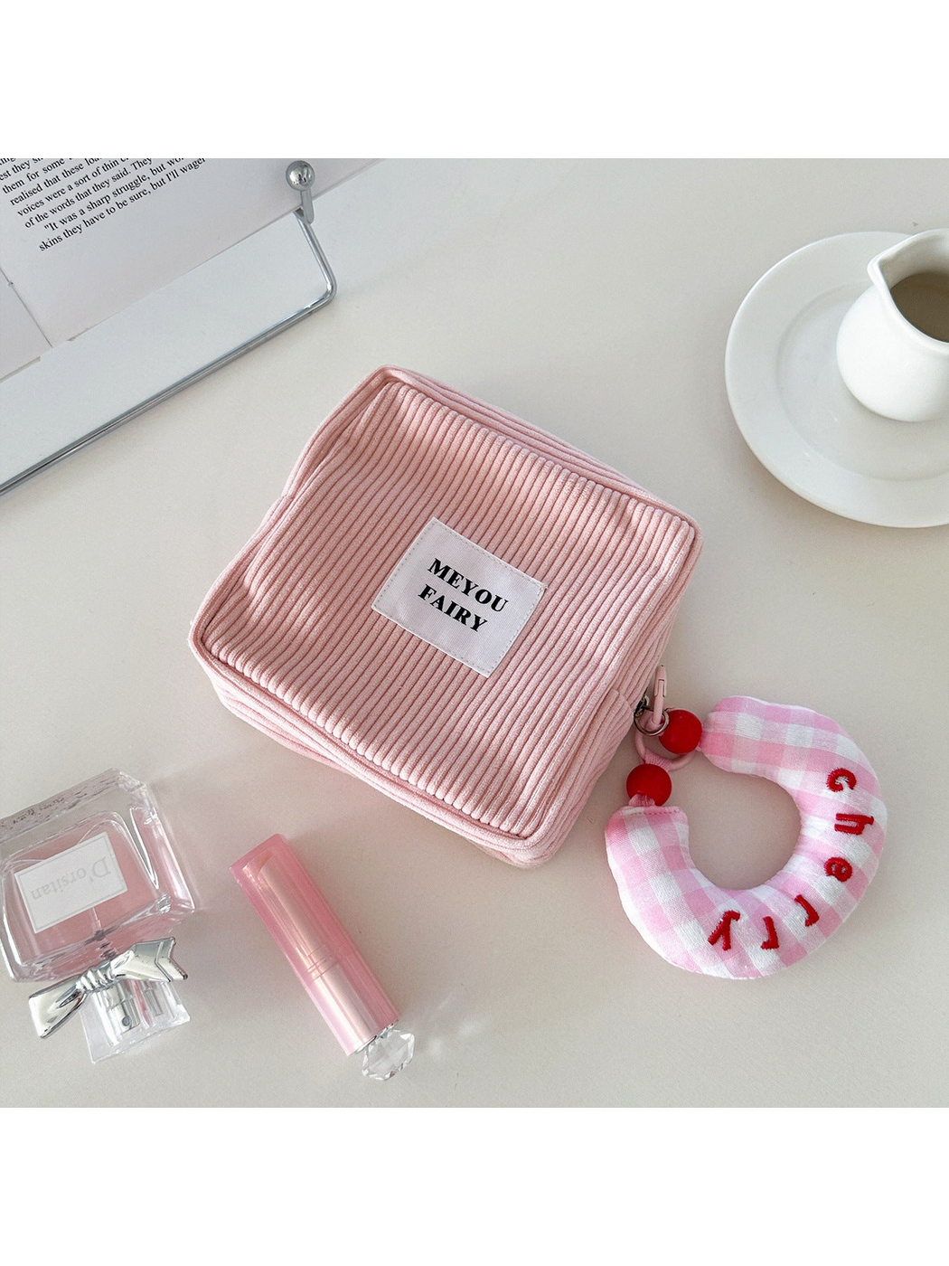 Pink ribbed makeup bag with pink checked charm