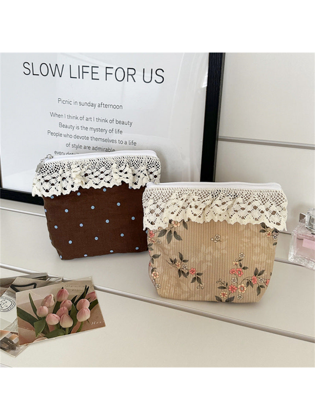 Brown polka-dot and Beige floral pouches standing upright with ivory lace trim
