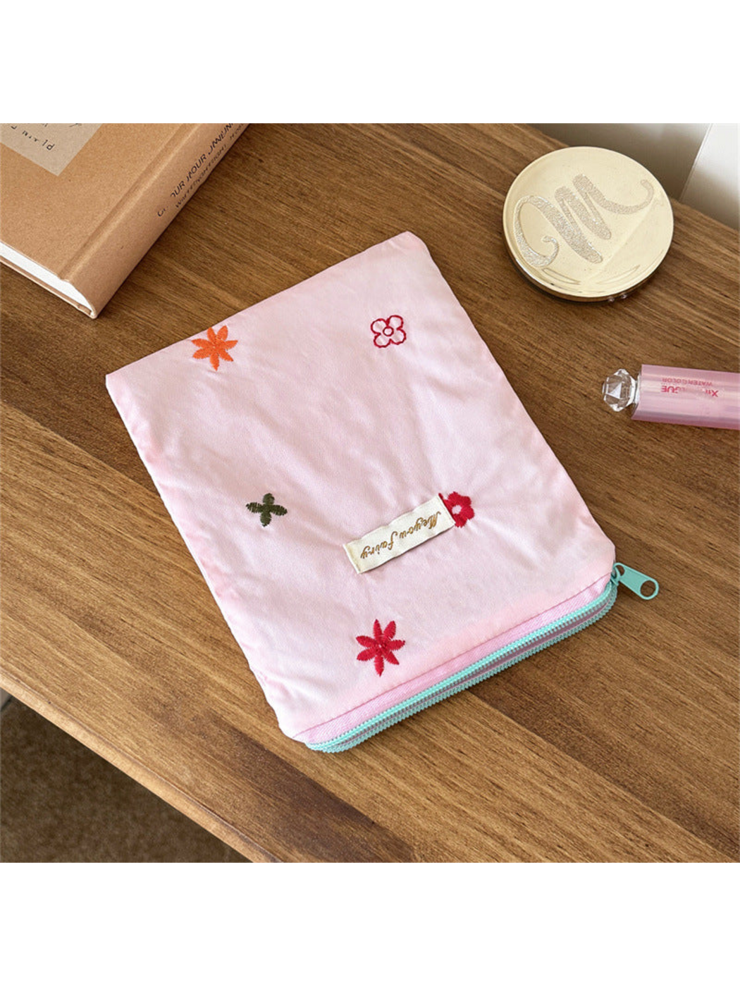 Pink rectangular pouch with scattered multicolored floral embroidery