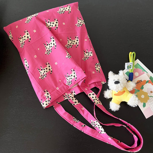 Cosbai pink tote bag with playful puppy print and sturdy handles